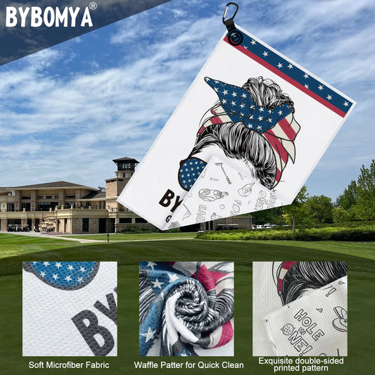 Close-up of Yamato magnetic golf towel showing American flag pattern fabric texture and brand logo detail.
