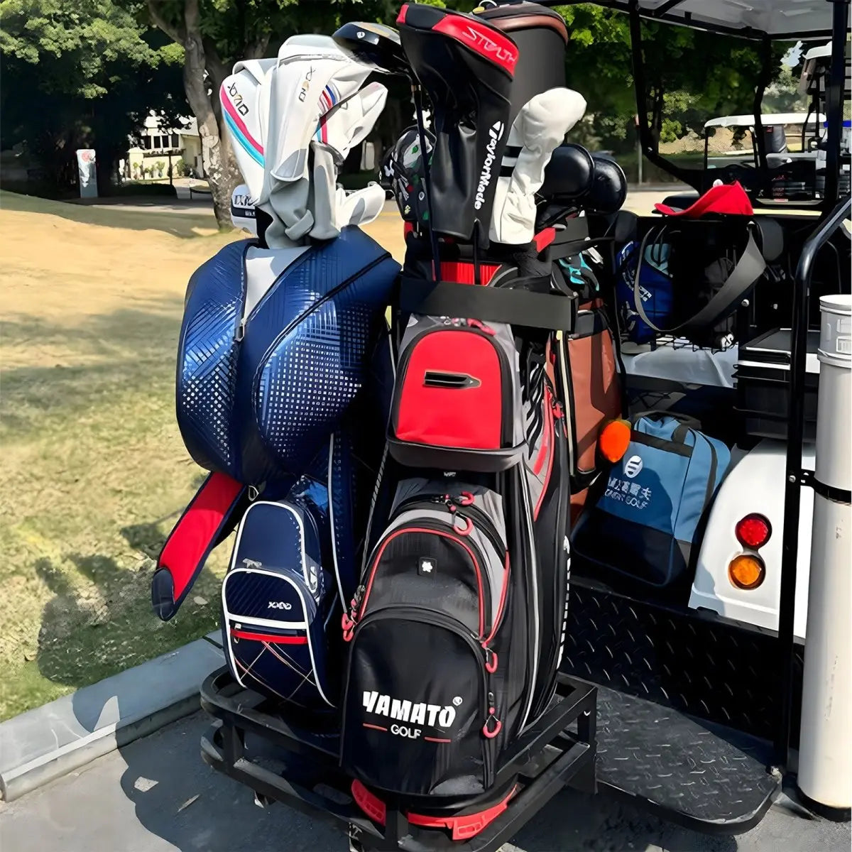 Yamato Golf bag in red and black color mounted on a golf cart at an outdoor course