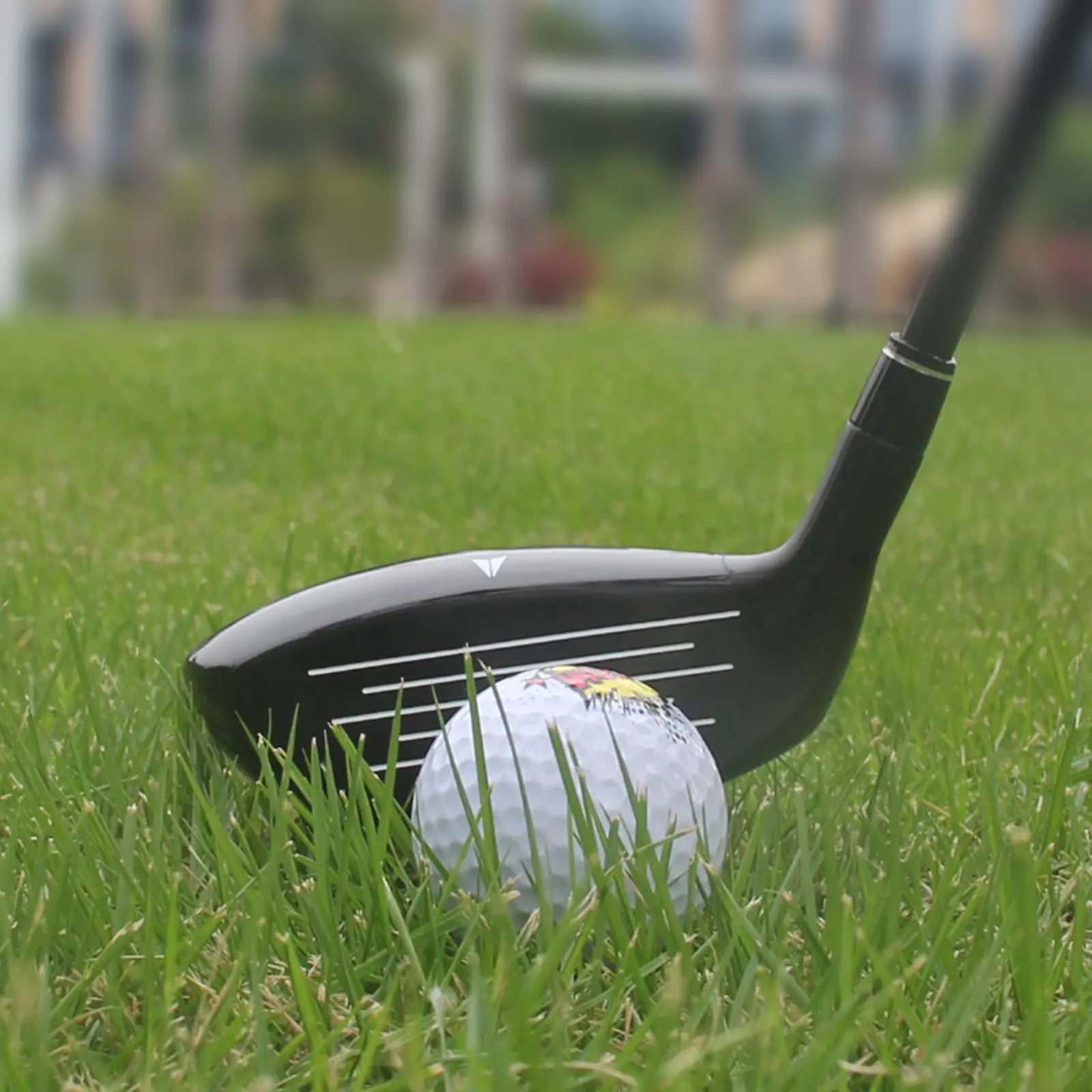 Yamato hybrid club in action on a golf course – perfect for long shots