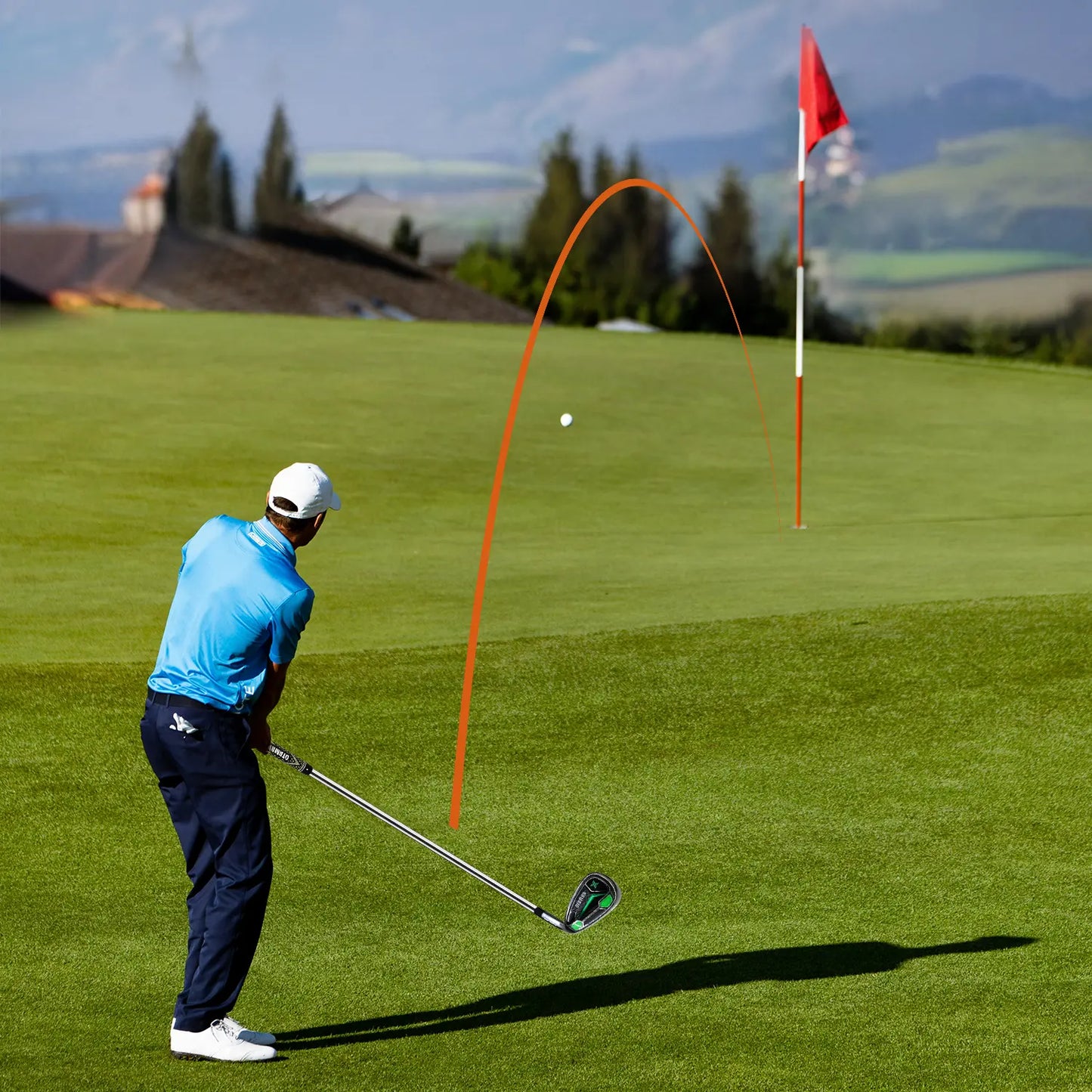 Golfer Using Yamato Stainless Steel Iron Club on Course