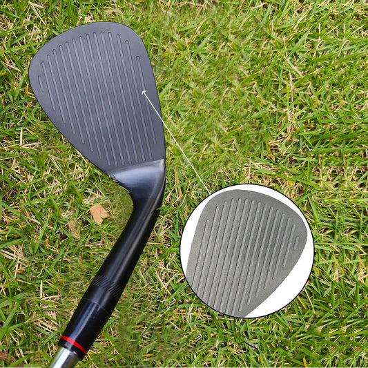 Yamato left-handed wedges aligned to show face grooves on the grass