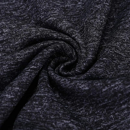 Close-up of the fabric texture of the Yamato Men's Slim Fit Golf Polo in black, demonstrating its lightweight and moisture-wicking properties.